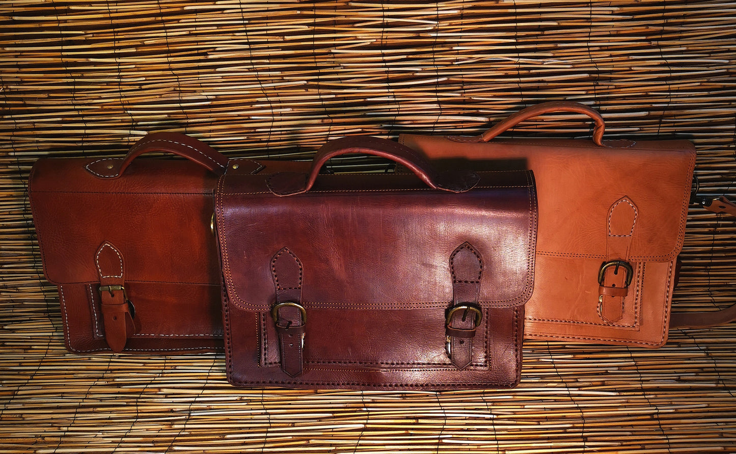 Cartable rigide double soufflet attache rapide
