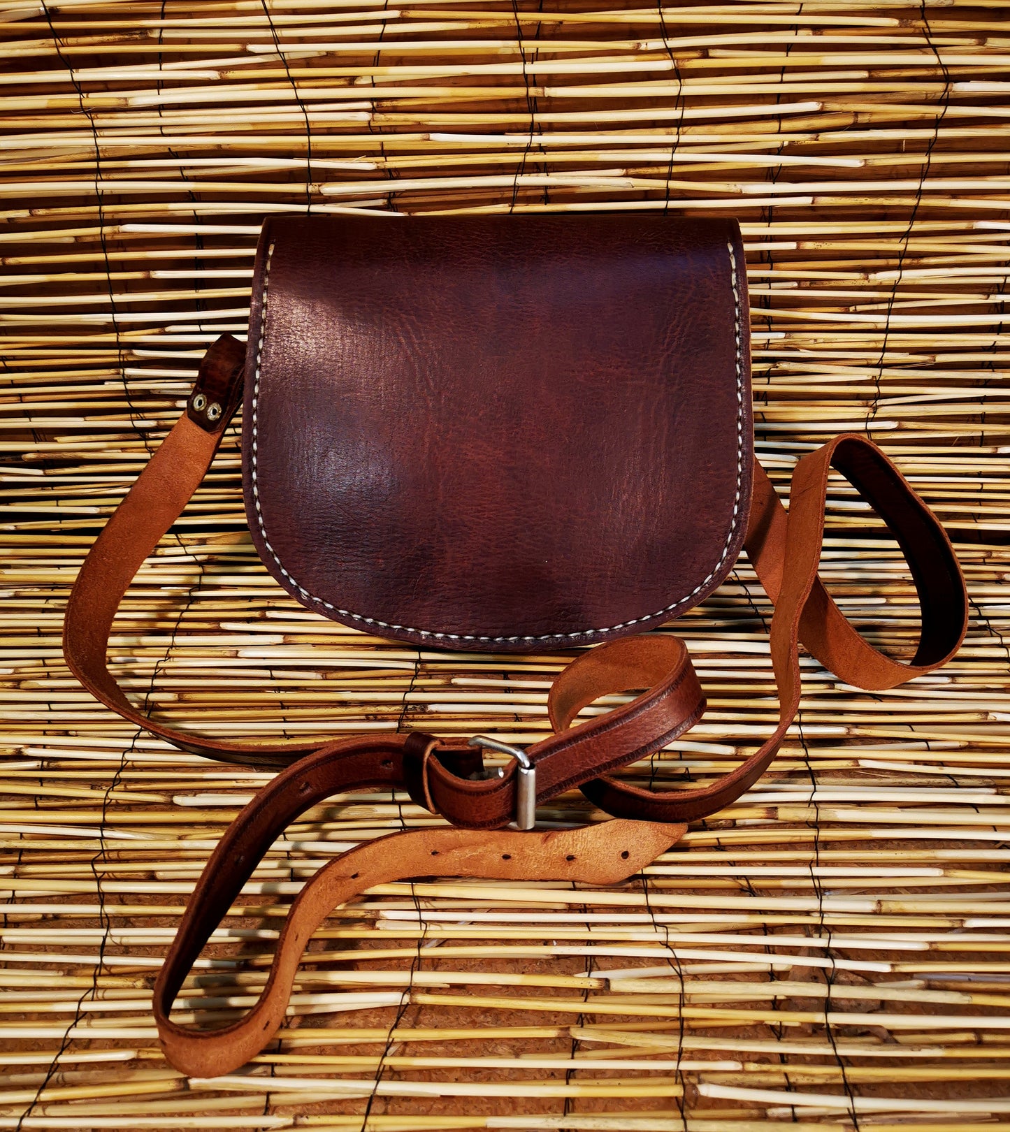 Sac à main demi rond attache tournante